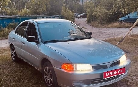 Mitsubishi Mirage VI рестайлинг, 2000 год, 250 000 рублей, 1 фотография