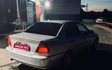 Mitsubishi Mirage VI рестайлинг, 2000 год, 250 000 рублей, 2 фотография