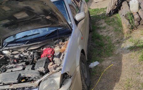 Ford Laser IV, 2002 год, 100 000 рублей, 3 фотография
