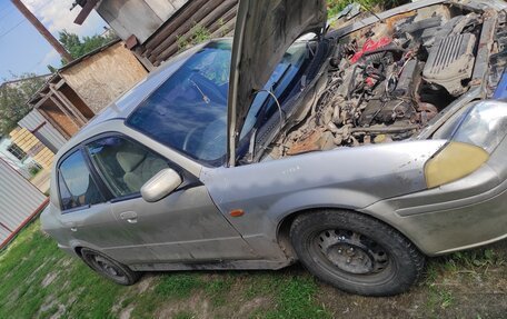 Ford Laser IV, 2002 год, 100 000 рублей, 5 фотография