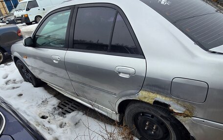 Ford Laser IV, 2003 год, 55 000 рублей, 3 фотография