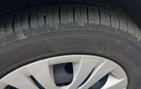 Toyota Corolla, 2011 год, 13 фотография