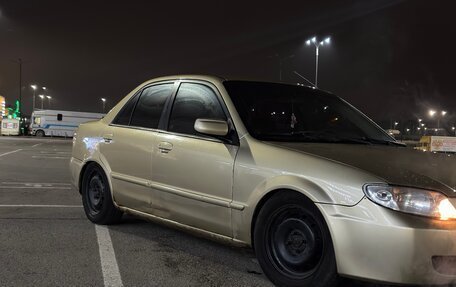 Mazda Protege, 2001 год, 250 000 рублей, 11 фотография