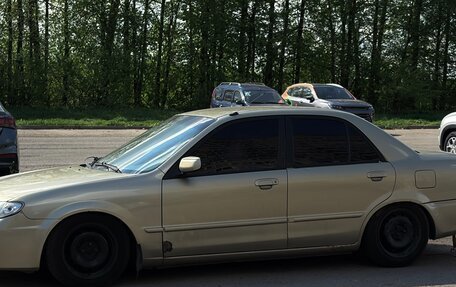 Mazda Protege, 2001 год, 250 000 рублей, 9 фотография