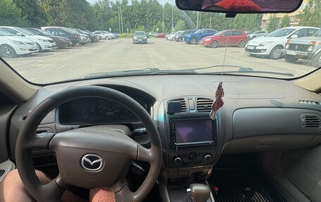Mazda Protege, 2001 год, 250 000 рублей, 7 фотография
