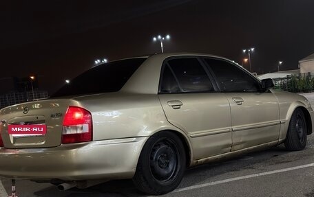 Mazda Protege, 2001 год, 250 000 рублей, 10 фотография