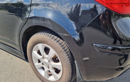 Nissan Tiida, 2011 год, 700 000 рублей, 26 фотография