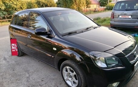KIA Rio II, 2010 год, 695 000 рублей, 16 фотография