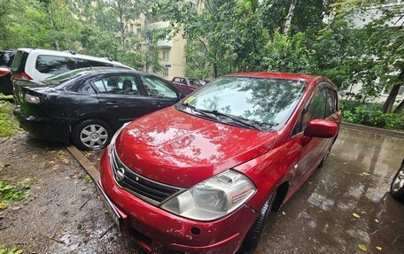 Nissan Tiida, 2010 год, 650 000 рублей, 2 фотография