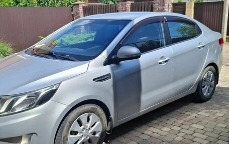 KIA Rio III рестайлинг, 2011 год, 860 000 рублей, 3 фотография