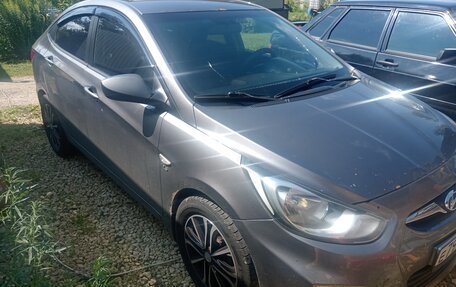 Hyundai Solaris II рестайлинг, 2011 год, 650 000 рублей, 2 фотография