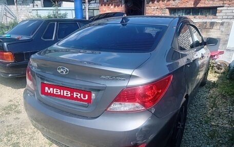 Hyundai Solaris II рестайлинг, 2011 год, 650 000 рублей, 4 фотография