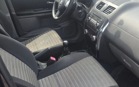 Suzuki SX4 II рестайлинг, 2010 год, 600 000 рублей, 11 фотография