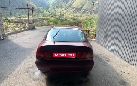 Mitsubishi Carisma I, 1996 год, 170 000 рублей, 3 фотография