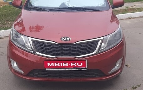 KIA Rio III рестайлинг, 2013 год, 999 999 рублей, 1 фотография