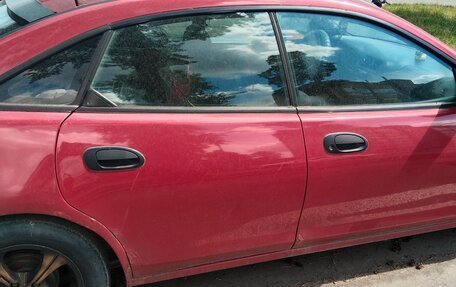 Mazda 323, 1997 год, 60 000 рублей, 3 фотография