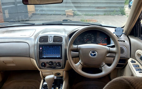 Mazda Familia, 2003 год, 140 000 рублей, 2 фотография