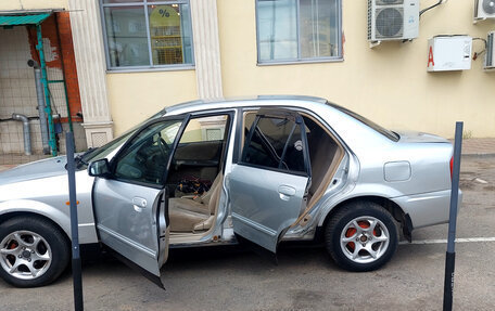 Mazda Familia, 2003 год, 140 000 рублей, 9 фотография