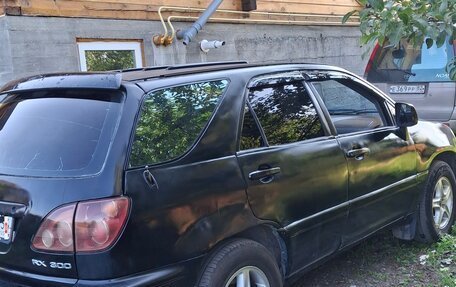Lexus RX IV рестайлинг, 1999 год, 650 000 рублей, 3 фотография