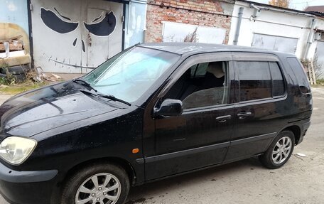 Toyota Raum I, 2000 год, 360 000 рублей, 2 фотография