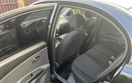 KIA Rio II, 2010 год, 600 000 рублей, 14 фотография