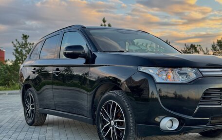 Mitsubishi Outlander III рестайлинг 3, 2013 год, 1 335 000 рублей, 12 фотография