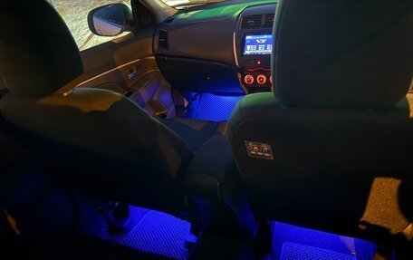 Mitsubishi RVR III рестайлинг, 2011 год, 1 380 000 рублей, 10 фотография