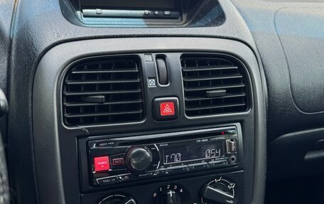 Mitsubishi Carisma I, 2002 год, 300 000 рублей, 24 фотография