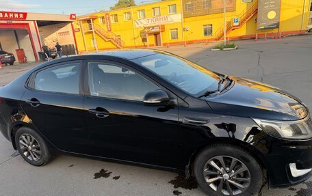 KIA Rio III рестайлинг, 2011 год, 900 000 рублей, 20 фотография