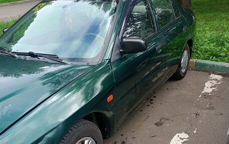 Mitsubishi Lancer VII, 1998 год, 130 000 рублей, 2 фотография