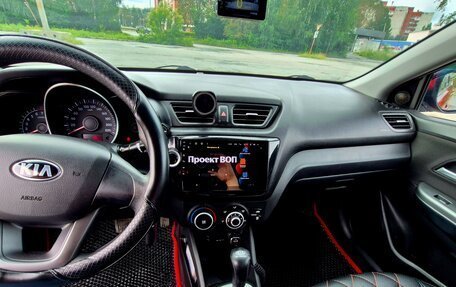 KIA Rio III рестайлинг, 2013 год, 900 000 рублей, 27 фотография