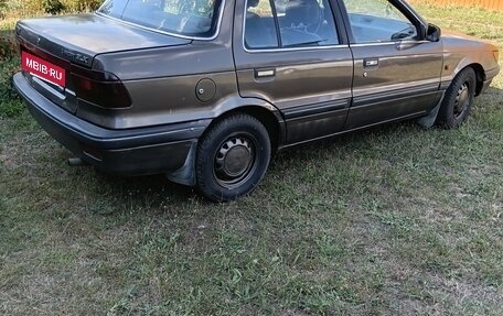 Mitsubishi Lancer VII, 1991 год, 260 000 рублей, 3 фотография