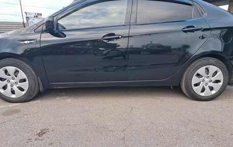 KIA Rio III рестайлинг, 2014 год, 550 000 рублей, 21 фотография