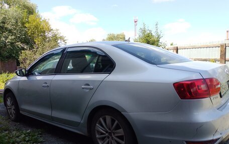 Volkswagen Jetta VI, 2013 год, 670 000 рублей, 3 фотография