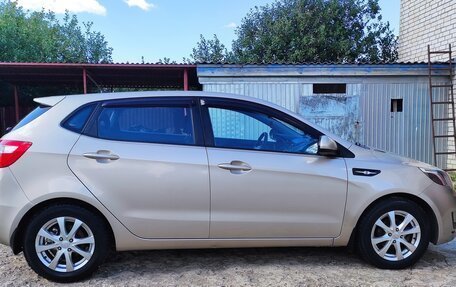 KIA Rio III рестайлинг, 2012 год, 770 000 рублей, 26 фотография