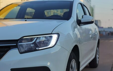 Renault Logan II, 2021 год, 890 000 рублей, 4 фотография