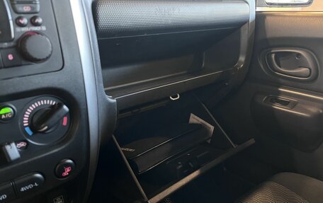 Suzuki Jimny, 2013 год, 1 486 000 рублей, 24 фотография