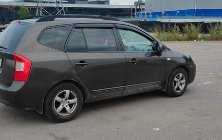 KIA Carens III (RP), 2010 год, 690 000 рублей, 7 фотография
