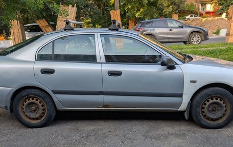 Mitsubishi Carisma I, 2003 год, 210 000 рублей, 3 фотография