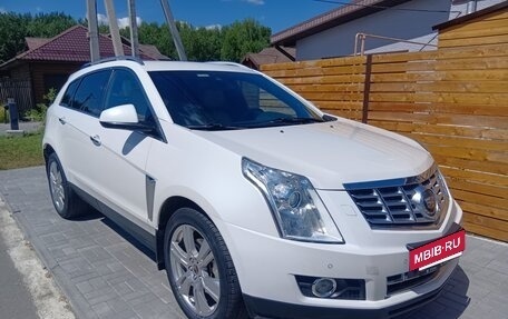 Cadillac SRX II рестайлинг, 2014 год, 1 800 000 рублей, 13 фотография