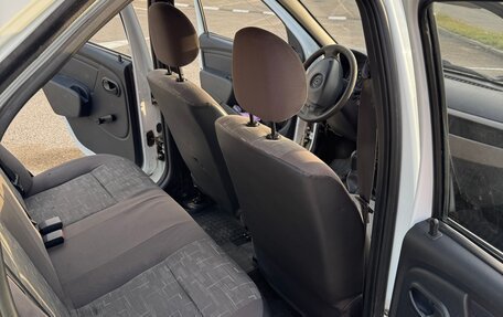 Renault Logan I, 2012 год, 310 099 рублей, 6 фотография