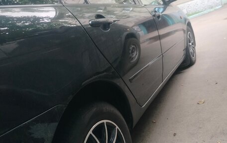 Toyota Corolla, 2004 год, 750 000 рублей, 4 фотография
