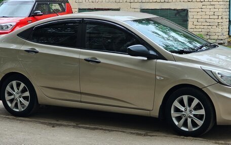 Hyundai Solaris II рестайлинг, 2011 год, 630 000 рублей, 2 фотография