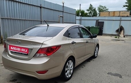 Hyundai Solaris II рестайлинг, 2011 год, 630 000 рублей, 29 фотография