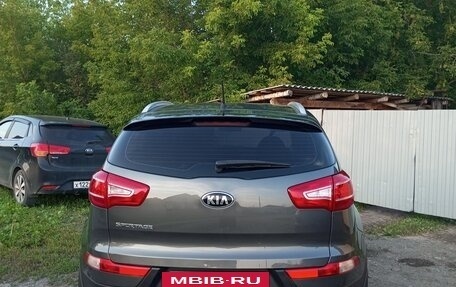 KIA Sportage III, 2012 год, 1 100 000 рублей, 11 фотография