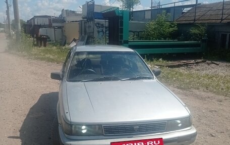 Nissan Bluebird IX, 1989 год, 2 фотография