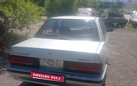 Nissan Bluebird IX, 1989 год, 14 фотография