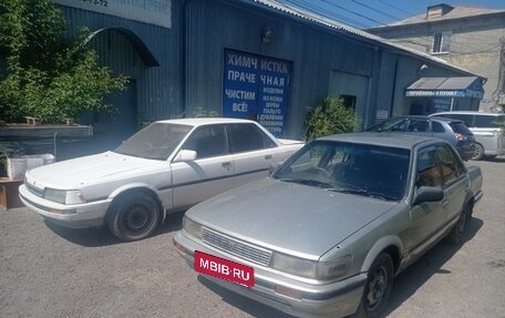 Nissan Bluebird IX, 1989 год, 15 фотография