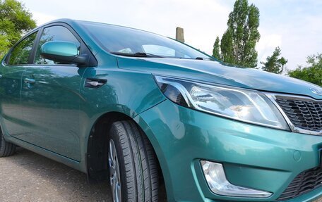 KIA Rio III рестайлинг, 2012 год, 940 000 рублей, 2 фотография