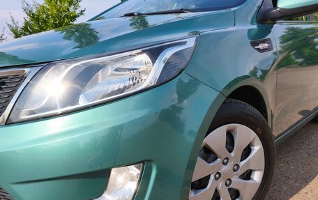 KIA Rio III рестайлинг, 2012 год, 940 000 рублей, 9 фотография